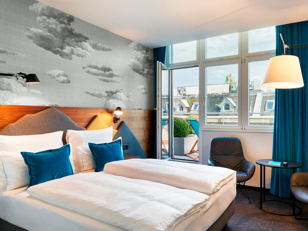 Motel One room interior with double bed and window view
